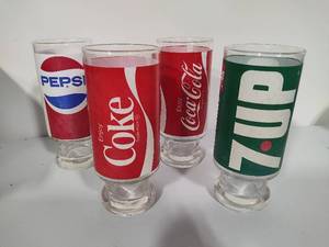 lot 24 image: Vintage Pepsi, Coke 7-Up Footed Glasses