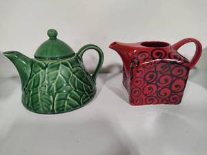 lot 44 image: Set of Two Fun Teapots
