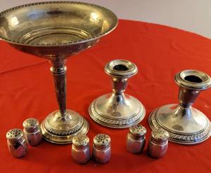 lot 8 image: Sterling Silver Tableware Assortment  Compote  Candle Holders  Salt & Peppers