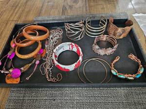 lot 7 image: Assortment Of Copper Jewelry, Wood & Pottery Bracelets