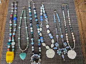 lot 9 image: Assorted Hand-Crafted Necklaces, Unique Charms, Beads