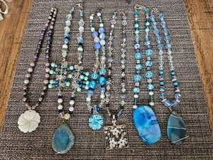 lot 18 image: Assorted Hand-Crafted Necklaces, Unique Charms, Beads