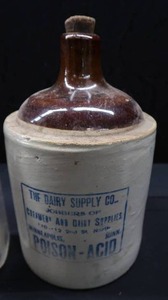 lot 8 image: CORKED LITTLE BROWN JUG POISON- ACID