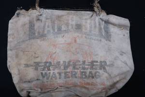 lot 18 image: RARE WATER BOY TRAVELER BAG