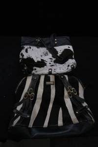 lot 107 image: COWHIDE WOMENS PURSES