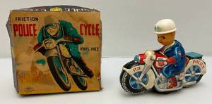 lot 12 image: 1960s Haji 8 Tin Friction Police Motorcycle (WORKS) In Original Box