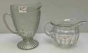 lot 56 image: Vintage Heisey Glass Pitcher 6 & Iris Heringbone Water Pitcher 9