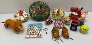 lot 57 image: Misc. Vintage Tin Toys & More Including Marx Brand Key Wind Tiger Works But As Seen Condition