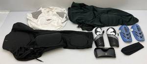 lot 166 image: Misc. Preowned Sporting Goods Including Football Pants Size Adult 2X, (WORN ONCE) Schutt Adult Lagre Padded Shirt & Misc. Kids Shin Guards