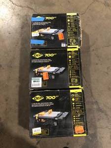 lot 25 image: Lot of 3 QEP 700XT 34 HP Wet Tile Saw with 7 in. Blade and Table Extension Customer Returns See Pictures