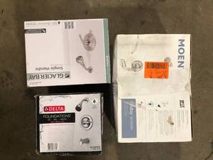 lot 29 image: Lot of 3 Moen Glacier Bay and Delta Shower Heads Customer Returns See Pictures