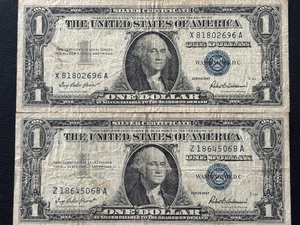 lot 7 image: 1957 Blue Seal $1 Dollar Silver Certificates