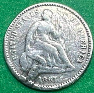 1861 Half Dime with Merchant Mark