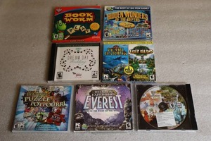 lot 157 image: PC Gaming Assorted Various Games...Hidden Wonders, Bookworm, Peral Harbor, Hidden Island, Everest, Puzzle Potpouri Etc...