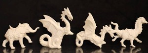 lot 113 image: Vintage Ceramic Bisque Dragons, Elephant Etc. Un-Painted Project
