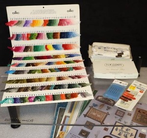 lot 125 image: Vintage Cross-Stitch Pattern Books, Floss and 1986 DMC Floss Chart Etc