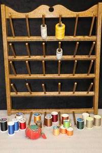 lot 213 image: Vintage Wall Mount Spool Thread Adjustable Display Rack wThread