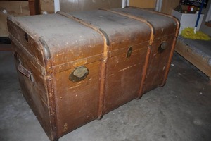 lot 228 image: Unique Antique Over-Sized Wood Travel Trunk wBrassCopper() Protective Edges and Both Handle Straps Intact...