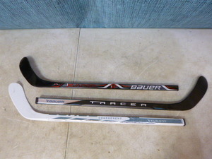 lot 56 image: 3 Mini Bauer Decorative Hockey Sticks