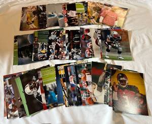 lot 130D image: (50) NFL Football 8x10 Photos