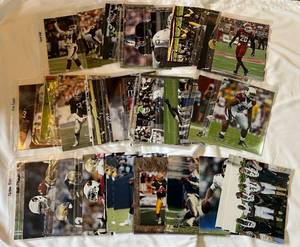 lot 132D image: (50) NFL Football 8x10 Photos