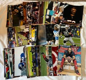 lot 134D image: (70) NFL Football 11x14 Photos
