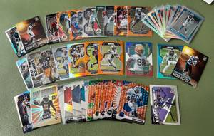 lot 95C image: (40) 2021 NFL Football Cards - Prizm RCs, Optic Rare Rookies, Inserts, Stars, Orange Lazer and Disco Ball, Mosaic, and More