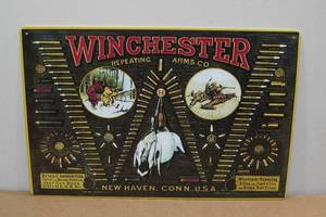 lot 99 image: Metal Novelty Sign -Winchester Repeating Arms Co