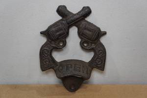 lot 103 image: Cast Iron Crossed Pistol Wall Mount Bottle Opener