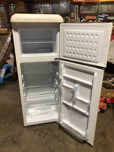 Frigidaire 7.5 cu. ft. Mini Fridge in Cream with Rounded Corners and Top Freezer Has Damage Customer Returns See all Pictures