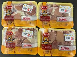 A&B - Collection of 4 Packages of Tyson All Natural Boneless Skinless Chicken Thighs Approx 6lbs