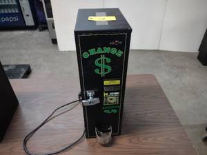 lot 18 image: American Changer AC1001