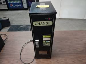 lot 21 image: American Changer AC1001