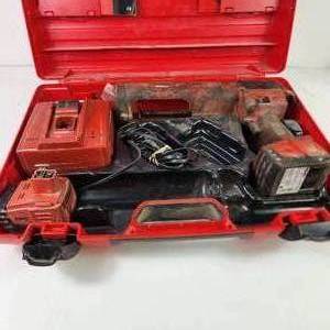 lot 69 image: Hilti Adhesive Gun Two Batteries And Charger Tested Works Good Condition
