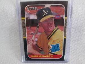 lot 297 image: 1986 Donruss Mark McGwire Rookie Ca...