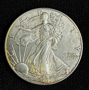 lot 4 image: 2000 Walking Liberty One Dollar 1 oz. Fine Silver (90%) Coin EF