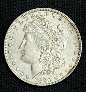 lot 28 image: 1880-P Morgan Silver Dollar VG