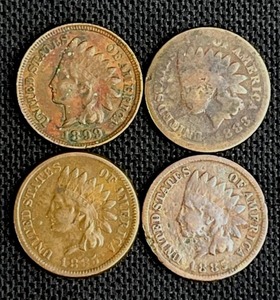 lot 50 image: Four Indian Head Pennies 1883, 1885, 1885, and 1899 (all VG)