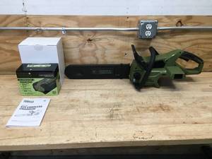 lot 6 image: Green Machine Cordless Chainsaw Model # GMCS6200