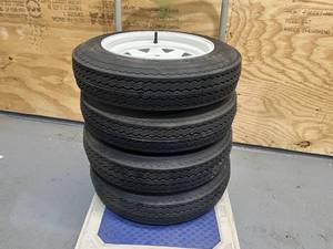 lot 104 image: JOURNEY Lot of 4 Tires- 4.80-12