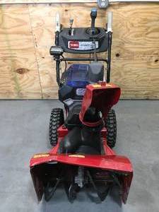 lot 15 image: Non-Working Toro Power Max E 60V 24-inch Two-Stage Cordless Electric Snow Blower Model # 39924 - Tool Only