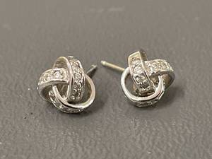 lot 55 image: Sparkling Knot Design Sterling Silver Stud Earrings Crystal Accents