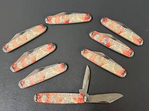 lot 64 image: Reagan-Bush 1980 Campaign Collectible Pocket Knives Set of 8 - Discolored