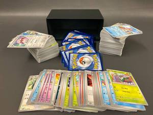 lot 104 image: Large Collection of Pokemon Trading Cards with Variety of Types and Levels
