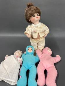lot 119 image: Vintage Ceramic Doll Set with Soft-Filled Babies