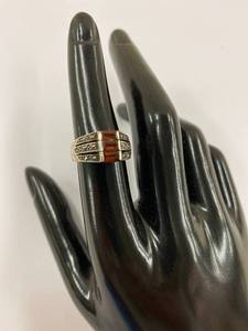 lot 17K image: Vintage Sterling Silver Ring with Garnet and Intricate Detailing