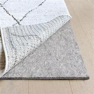 lot 43 image: RUGPADUSA Essentials 8 ft. x 10 ft. Non-Slip Dual Surface Felt  Rubber 38 in. Thick Rug Pad Customer Return Review all pictures