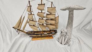 Model Ship and Mermaid Statue