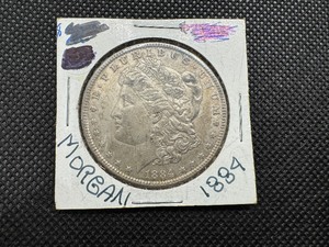 lot 9 image: 1884 Morgan Silver Dollar