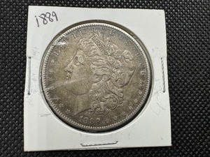lot 13 image: 1889 Morgan Silver Dollar